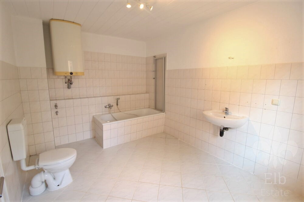 3 Raum Maisonettewohnung in Rogätz mit Tageslichtbad, modernem Fußboden und Dachboden - Photo 4